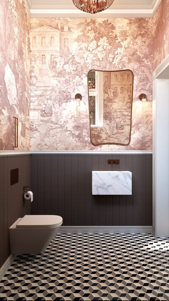 Baie mică de lux cu tapet roz prăfuit cu peisaj, lambriu maro, pardoseală alb-negru geometrică și lavoar din marmură suspendat. Amenajare realizată de Fabiano Interiors, expert design interior Oradea.