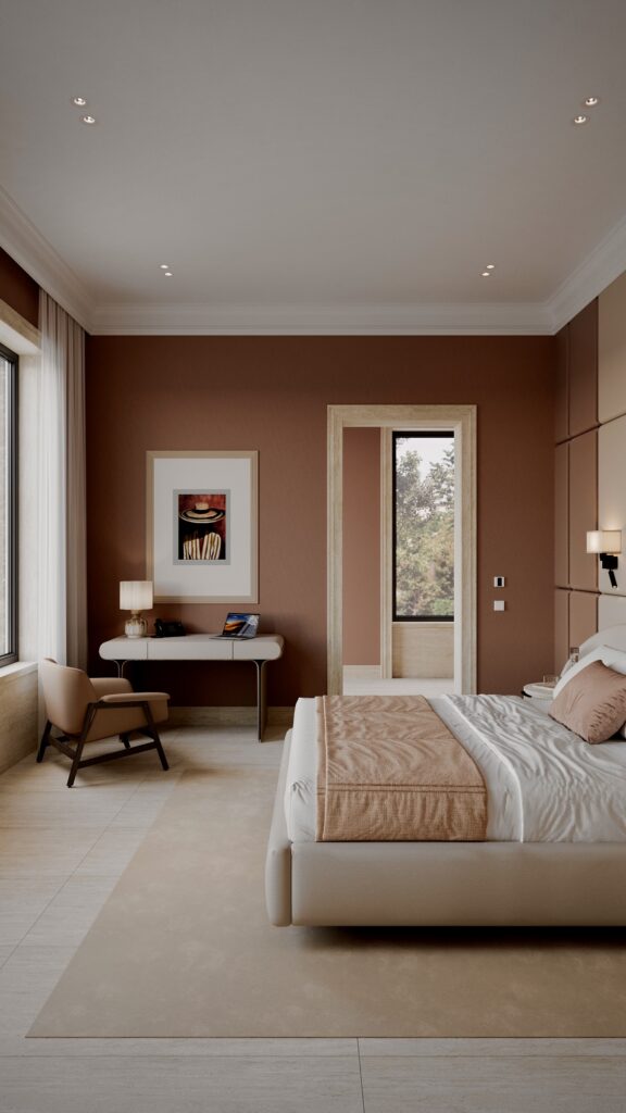 Dormitor modern cu perete teracotă, pat tapițat crem și birou minimalist, design Fabiano Interiors. Amenajare realizată de Fabiano Interiors, expert design interior Oradea.