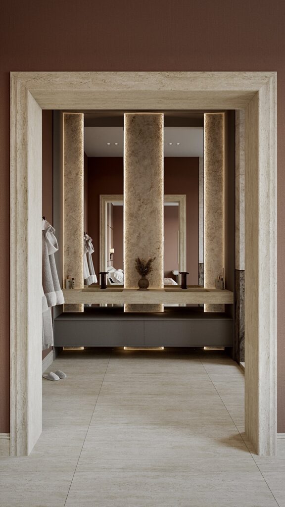 Design interior baie contemporană cu placări din piatră, duș deschis și mobilier suspendat minimalist Amenajare realizată de Fabiano Interiors, expert design interior Oradea.