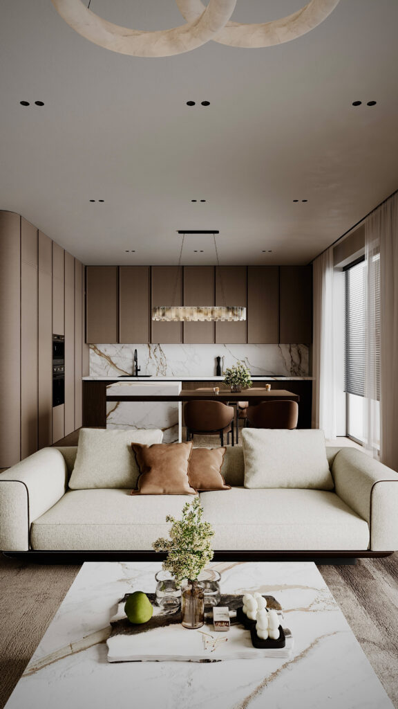 Amenajare open space cu bucătărie și living, insulă din marmură, mobilier minimalist în tonuri de bej și corpuri de iluminat circulare, design Fabiano Interiors.