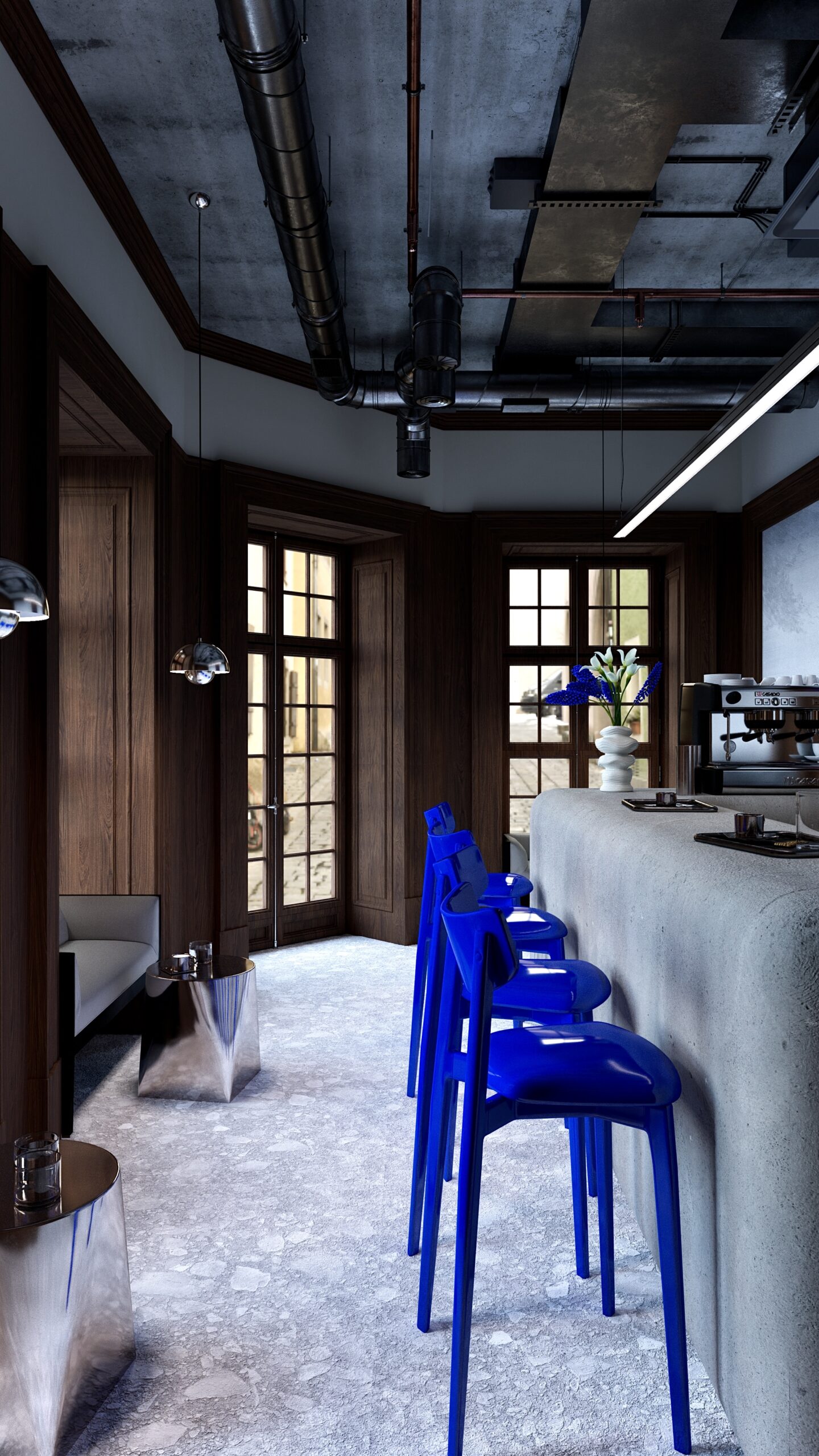 Amenajare interioară de cafenea în Oradea realizată de Fabiano Interiors, cu bar curbat cu finisaj texturat, mobilier din lemn închis, scaune albastre, ferestre cu tâmplărie din lemn și instalații aparente integrate în designul tavanului. Interior contemporan cu accente industriale, materiale naturale și iluminat decorativ.